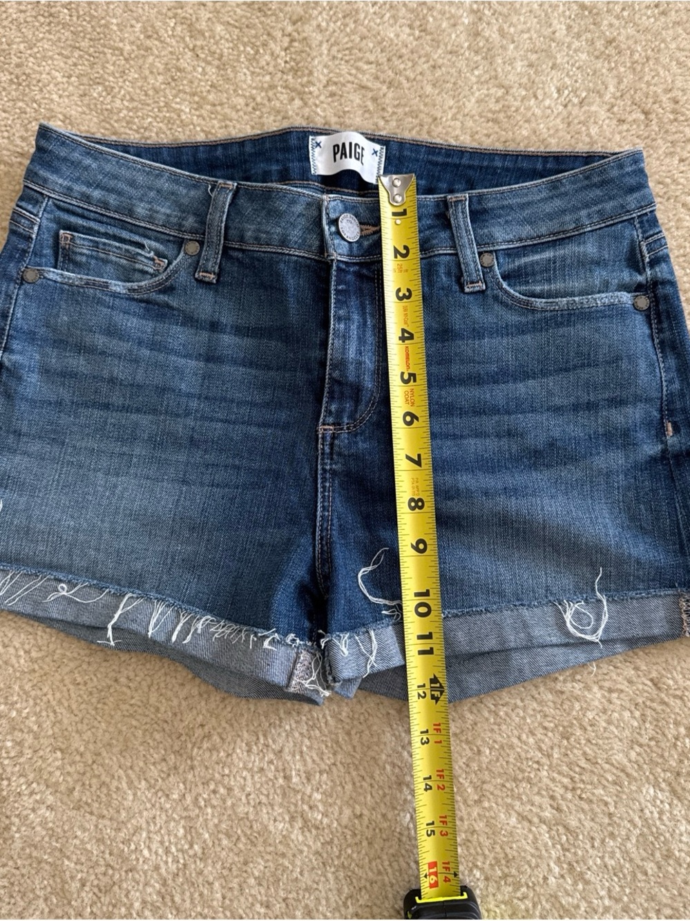 PAIGE Medium Blue Frayed Hem Denim Shorts